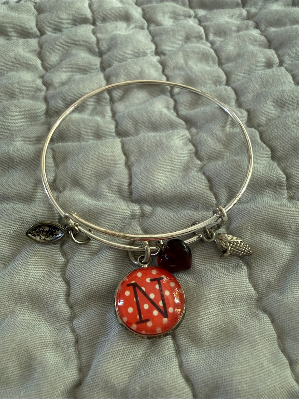 2 football bracelets Nebraska
 Husker  'N' Silver Charm Bangle Bracelet